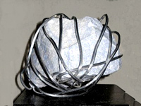 sculpture of stone and metal wire, 2010; Ann Porcelijn